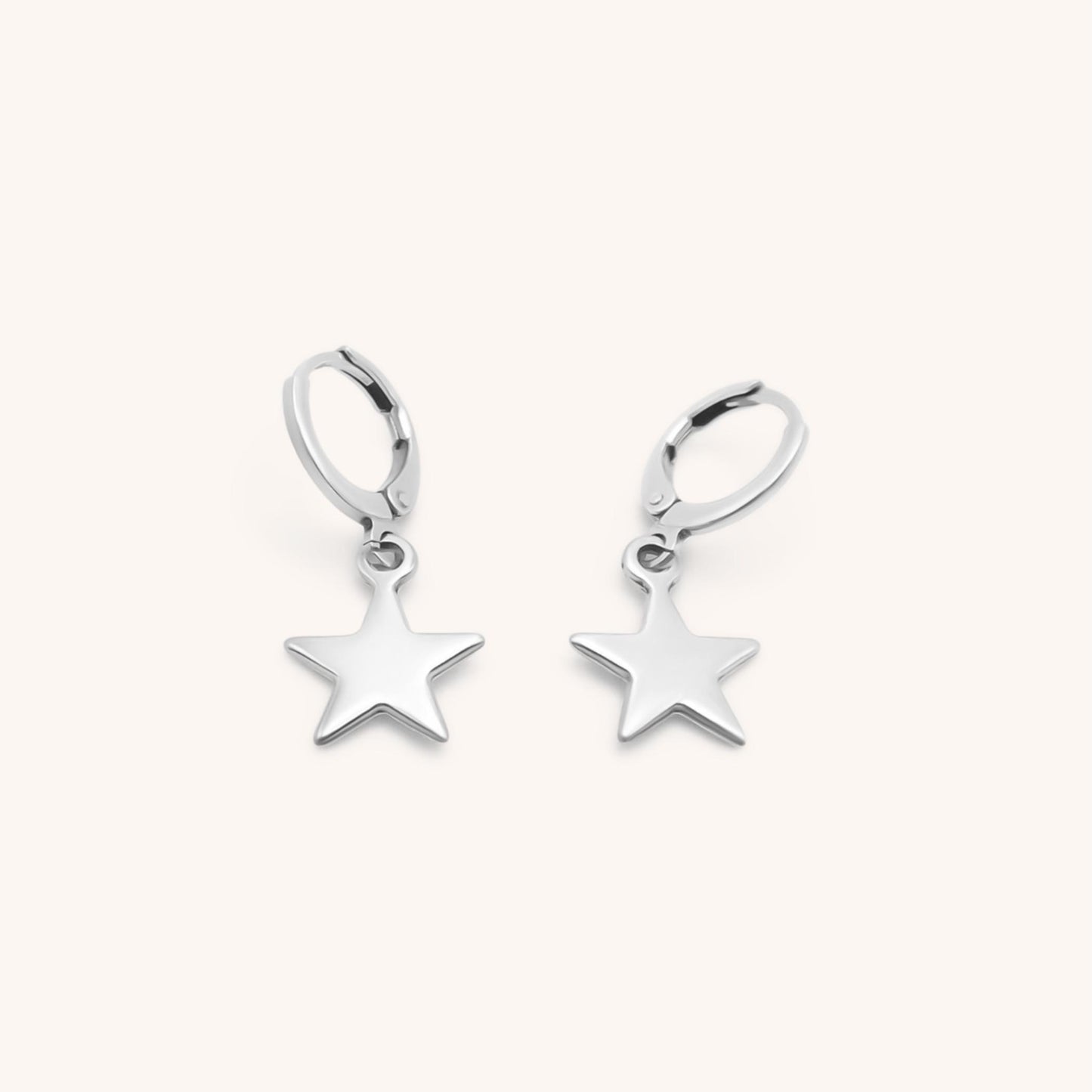 30E3112 - Star Huggie Hoops, Silver