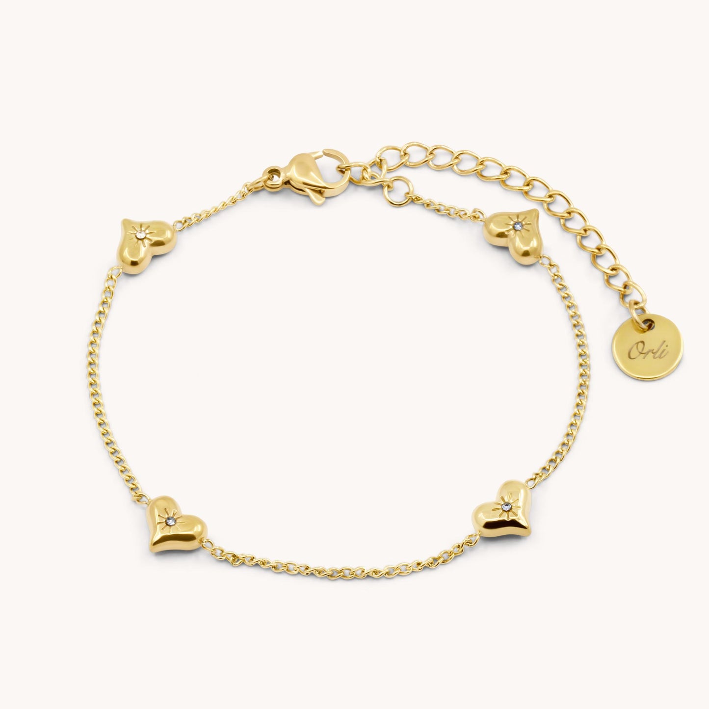 30B2019G - Crystal Starburst Multi Heart Bracelet, Gold